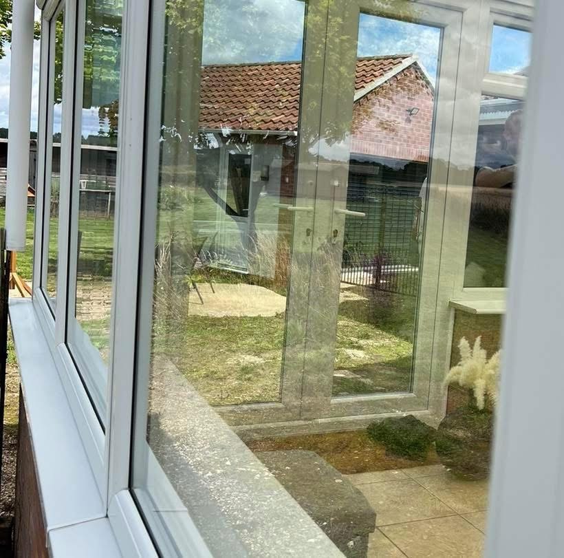 Sparkling clean conservatory glass doors and windows after professional cleaning by Moonshine Window Cleaning in Lincolnshire